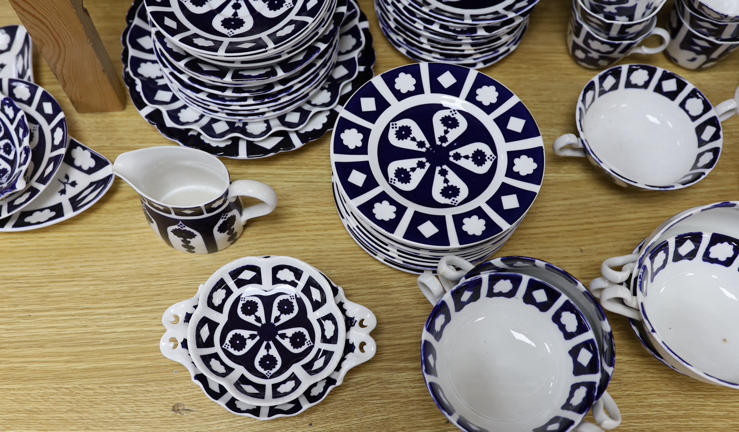 Unfinished Royal Crown Derby bone china dinner service and tea ware, comprising teapots, cups, saucers, dinner plates, side plates, coffee cans, etc.